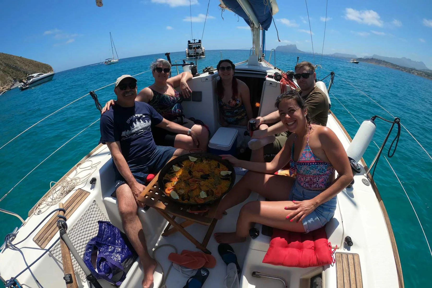 Lunch and conversation on board a sailing boat
